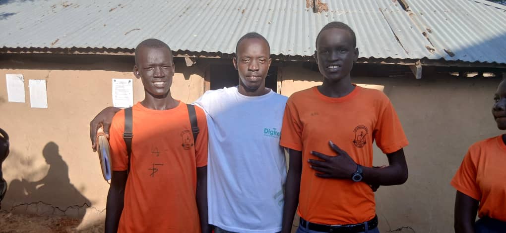 Teacher and students at Saint Andrews High School